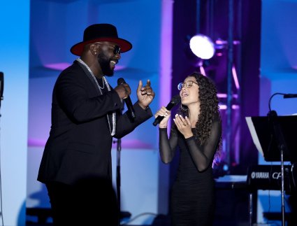 Wanya Morris and Liamani Segura performing for Mariah Carey