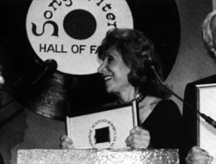 Jule Styne presents the 1991 Johnny Mercer Award to Betty Comden and Adolph Green.