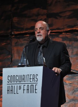 Billy Joel inducts Mick Jones and Lou Gramm
