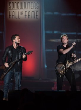 Ryan Peake and Chad Kroeger perform for Steven Tyler and Joe Perry