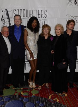 (left to right) SHOF Board member Evan Lamberg, inductee Tony Hatch, SHOF Chairman Jimmy Webb, Natalie Cole, SHOF President/CEO Linda Moran, Petula Clark, Rob Thomas and inductee JD Souther 