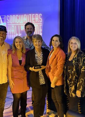 Pictured Front (L to R): Kyle Norman, Cindy Walker Documentary and CWF Foundation Member; Lindsay Liepman of Cindy Walker Foundation; Cindy Walker’s niece Molly Walker; Fancy Mills Knebel, CWF Board Member and Walker Family Member; SHOF inductee Liz Rose; and Fletcher Foster, SHOF Board Member and Chairman of SHOF Nashville Committee. 
Pictured Back: Michael Kirk, Cindy Walker film Director/Producer. 

