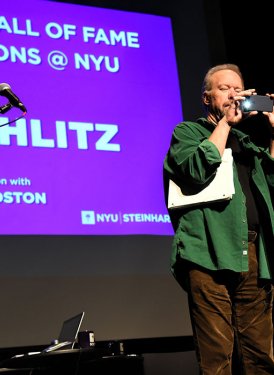 Don Schlitz takes the stage with a quick audience photo-op. (All photos by April Anderson)