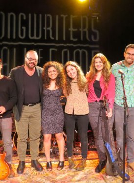 Desmond Child taking a bow with the USC student ensemble